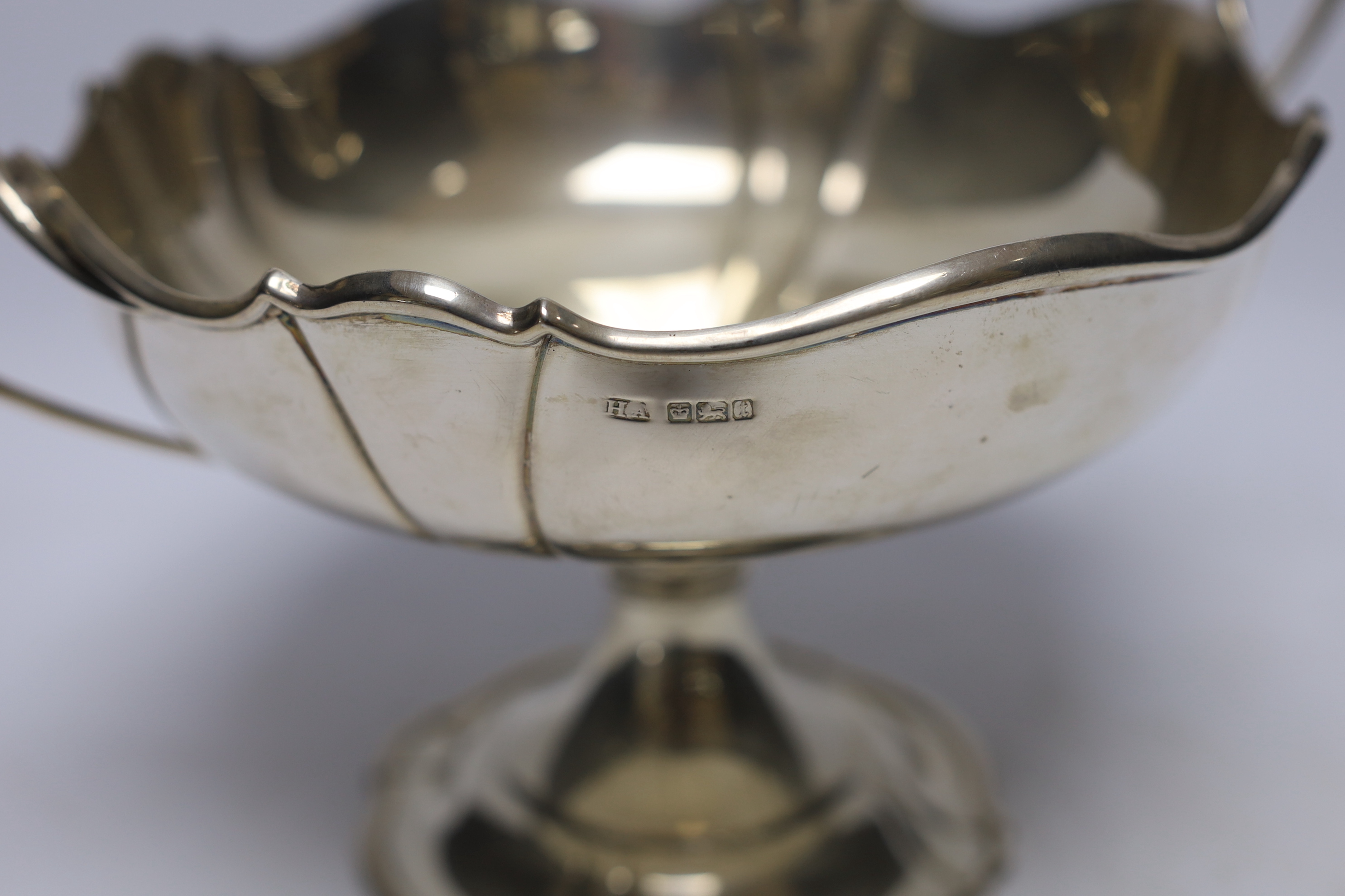 A George V silver two handled pedestal fruit bowl, by Atkin Brothers, Sheffield, 1911, 32.6cm over handles, 26oz.